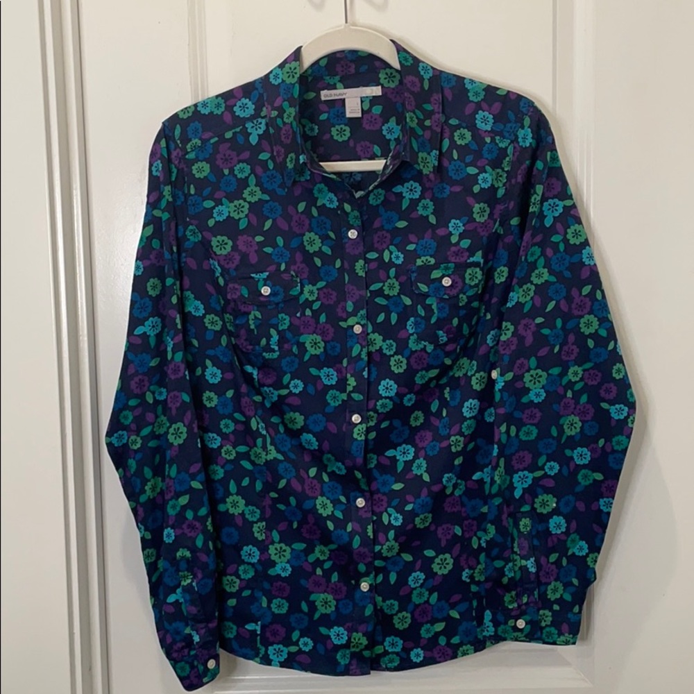 We are selling a women’s large button up shirt.